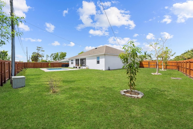 view of yard featuring a fenced backyard and a fenced in pool