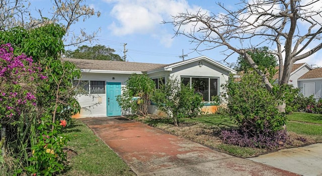 923 N H St, Lake Worth Beach, FL 33460 - view of front of house with stucco siding