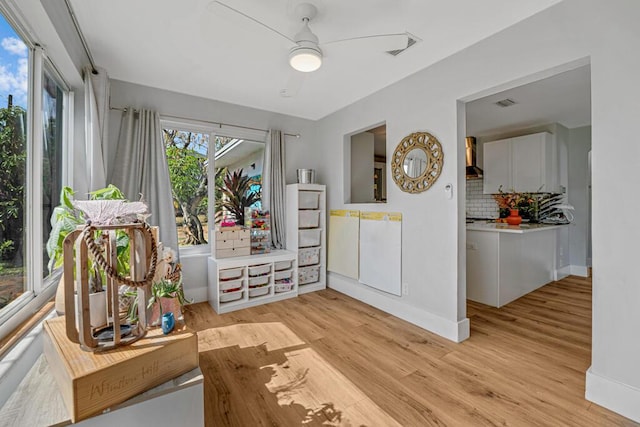 923 N H St, Lake Worth Beach, FL 33460 - sitting room featuring light wood-style floors, baseboards, ceiling fan, and visible vents
