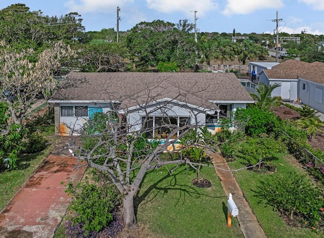 923 N H St, Lake Worth Beach, FL 33460 - exterior space with roof with shingles