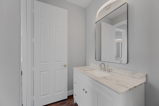 1317 Beacon Cir, Wellington, FL 33414 - bathroom featuring vanity and wood finished floors