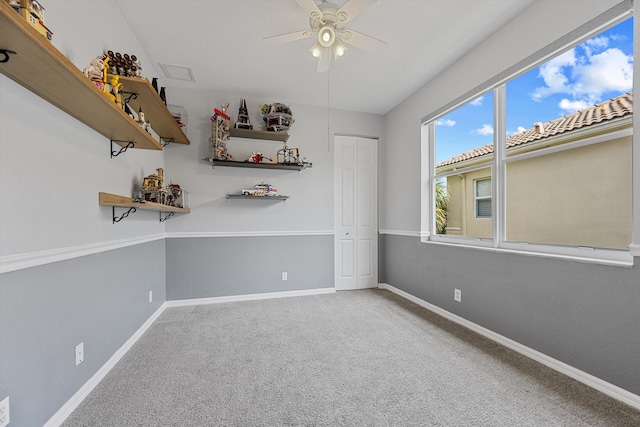 1317 Beacon Cir, Wellington, FL 33414 - carpeted empty room with ceiling fan and baseboards