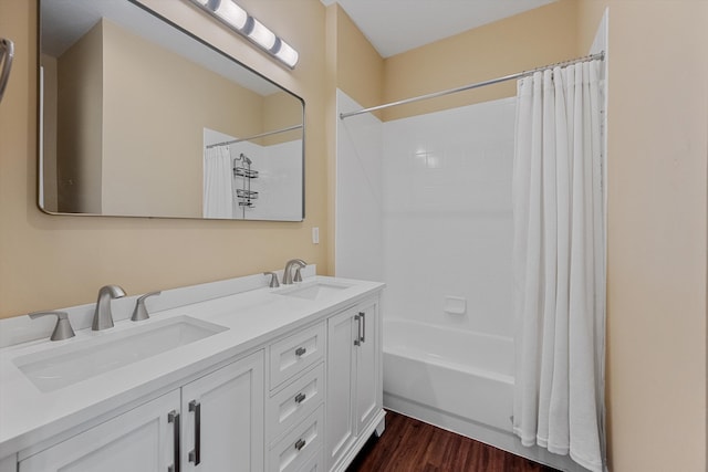 1317 Beacon Cir, Wellington, FL 33414 - bathroom featuring wood finished floors, shower / bathtub combination with curtain, and double vanity