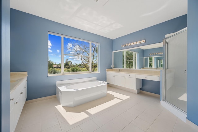 1317 Beacon Cir, Wellington, FL 33414 - bathroom with vanity, a shower stall, baseboards, and a garden tub
