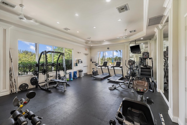 1317 Beacon Cir, Wellington, FL 33414 - exercise room with ornamental molding, a tray ceiling, and recessed lighting
