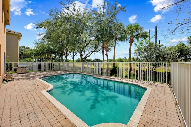 1317 Beacon Cir, Wellington, FL 33414 - view of pool featuring fence and a patio