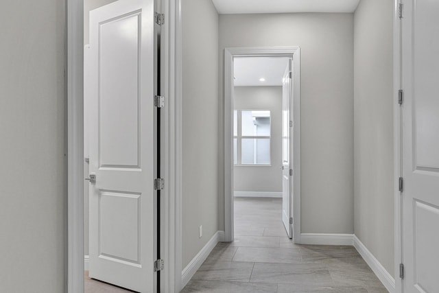10148 Driftwood Way, Palm Beach Gardens, FL 33412 - corridor with baseboards