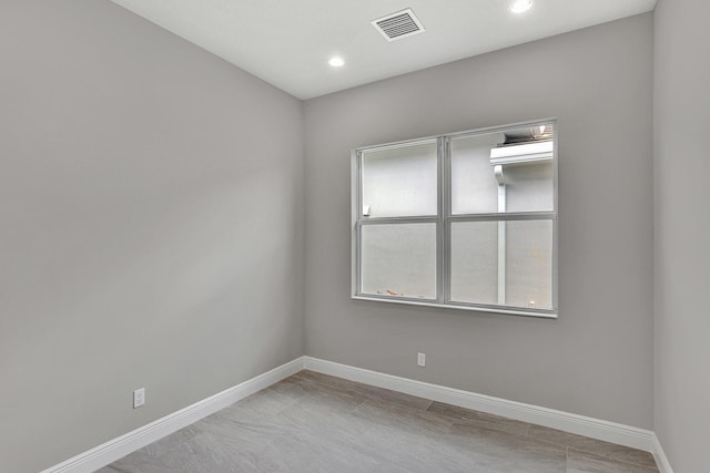 10148 Driftwood Way, Palm Beach Gardens, FL 33412 - unfurnished room featuring baseboards and recessed lighting