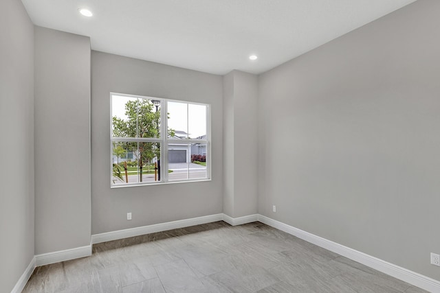 10148 Driftwood Way, Palm Beach Gardens, FL 33412 - empty room featuring baseboards and recessed lighting