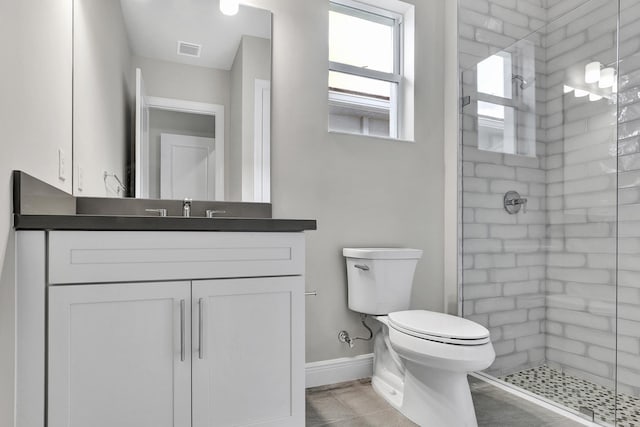 10148 Driftwood Way, Palm Beach Gardens, FL 33412 - full bathroom featuring a shower stall, vanity, toilet, and baseboards