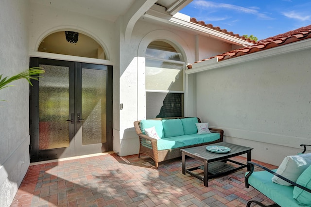 view of patio with french doors and outdoor lounge area
