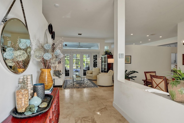 hallway featuring french doors, baseboards, and recessed lighting
