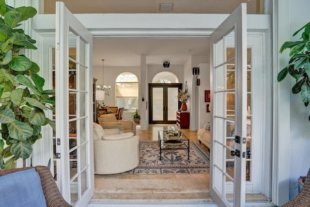 doorway to property featuring french doors