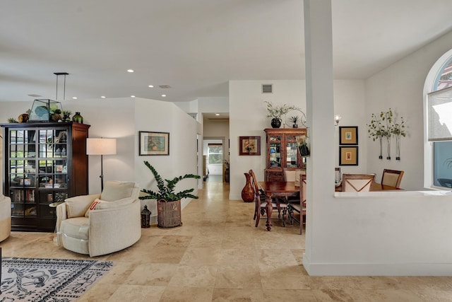 living room featuring baseboards