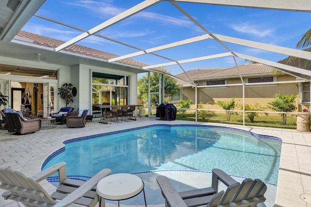 outdoor pool with outdoor lounge area, a patio area, outdoor dining space, and a lanai