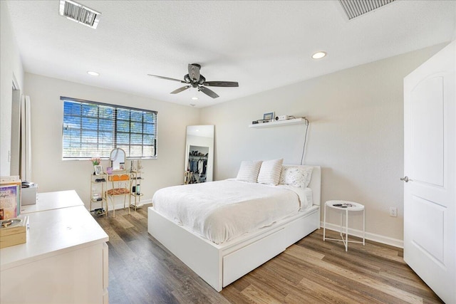 4738 Sundance Way, Davie, FL 33328 - bedroom with visible vents, recessed lighting, baseboards, and wood finished floors