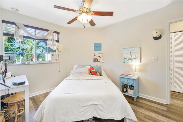 4738 Sundance Way, Davie, FL 33328 - bedroom with baseboards, ceiling fan, and wood finished floors