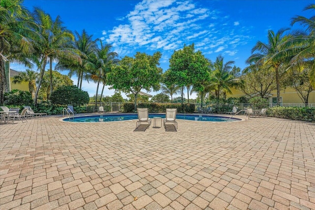 4738 Sundance Way, Davie, FL 33328 - pool with fence and a patio area