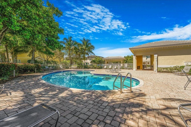 4738 Sundance Way, Davie, FL 33328 - pool featuring a patio area and fence