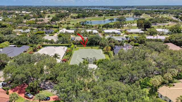 aerial perspective of suburban area featuring a large body of water