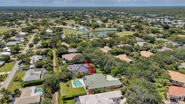 aerial perspective of suburban area featuring a large body of water