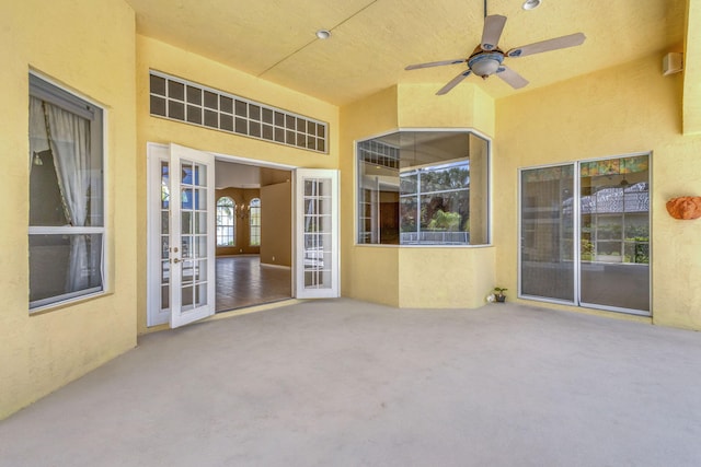 view of patio / terrace with french doors and ceiling fan