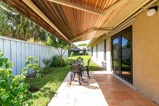 view of patio featuring french doors