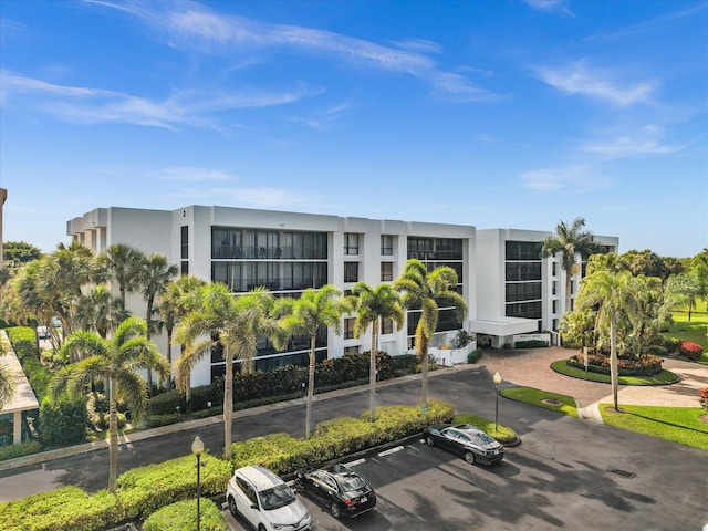 20110 Boca W Dr Unit 232, Boca Raton, FL 33434 - view of property with uncovered parking