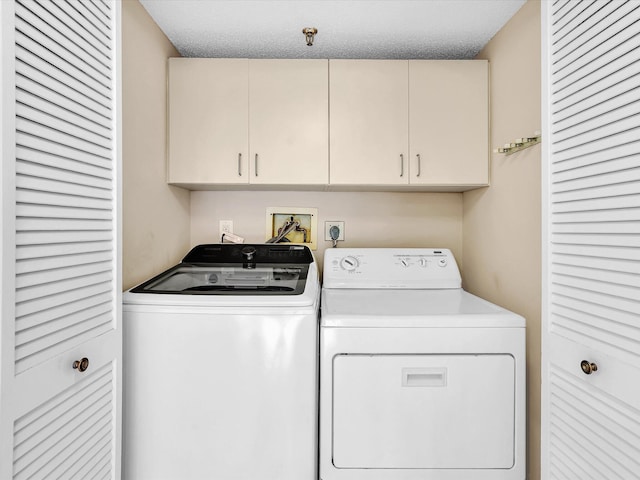 20110 Boca W Dr Unit 232, Boca Raton, FL 33434 - laundry area with separate washer and dryer and cabinet space