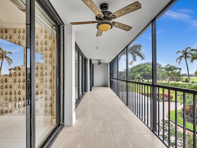 20110 Boca W Dr Unit 232, Boca Raton, FL 33434 - unfurnished sunroom with a ceiling fan