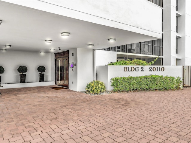 20110 Boca W Dr Unit 232, Boca Raton, FL 33434 - exterior space featuring stucco siding