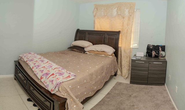 3500 Briar Bay Blvd Unit 106, West Palm Beach, FL 33411 - bedroom featuring light tile patterned floors and baseboards