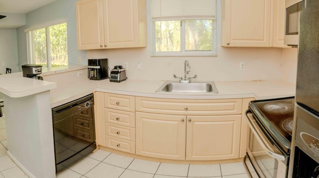 3500 Briar Bay Blvd Unit 106, West Palm Beach, FL 33411 - kitchen with black dishwasher, a sink, electric range oven, a peninsula, and light countertops