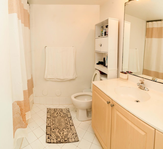 3500 Briar Bay Blvd Unit 106, West Palm Beach, FL 33411 - bathroom with tile patterned floors, toilet, vanity, and curtained shower