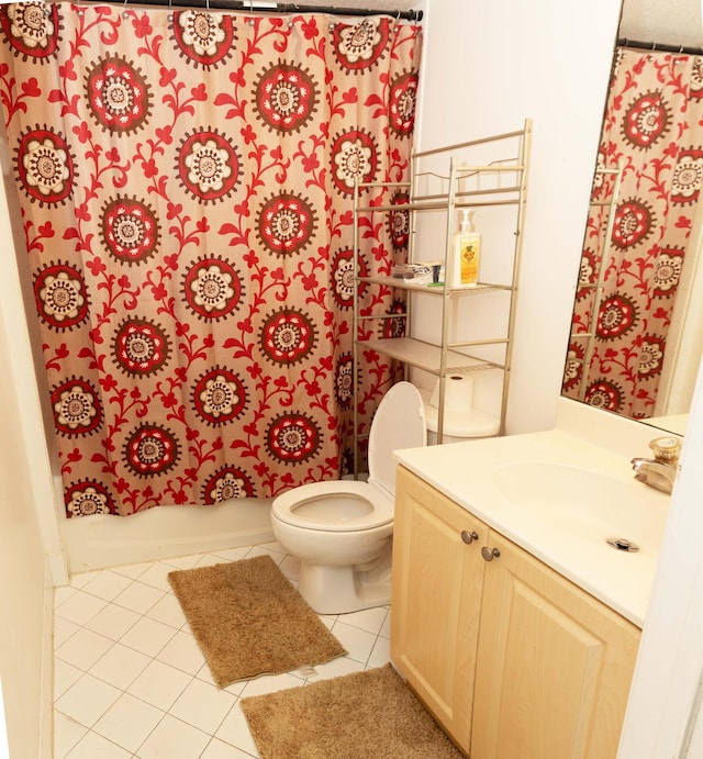 3500 Briar Bay Blvd Unit 106, West Palm Beach, FL 33411 - bathroom with toilet, vanity, and tile patterned floors