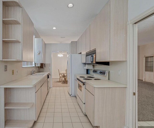 1501 Lee Ct, Lake Worth, FL 33461 - kitchen featuring open shelves, white electric range oven, black microwave, light countertops, and recessed lighting