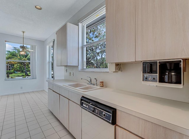1501 Lee Ct, Lake Worth, FL 33461 - kitchen with dishwasher, light countertops, light tile patterned floors, decorative light fixtures, and a textured ceiling