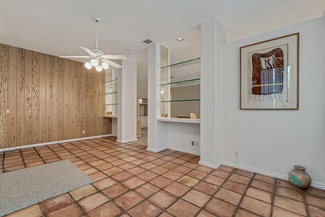 1501 Lee Ct, Lake Worth, FL 33461 - unfurnished room featuring wood walls and a ceiling fan