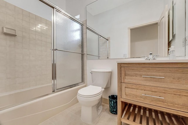 1501 Lee Ct, Lake Worth, FL 33461 - bathroom featuring vanity, combined bath / shower with glass door, and tile patterned floors