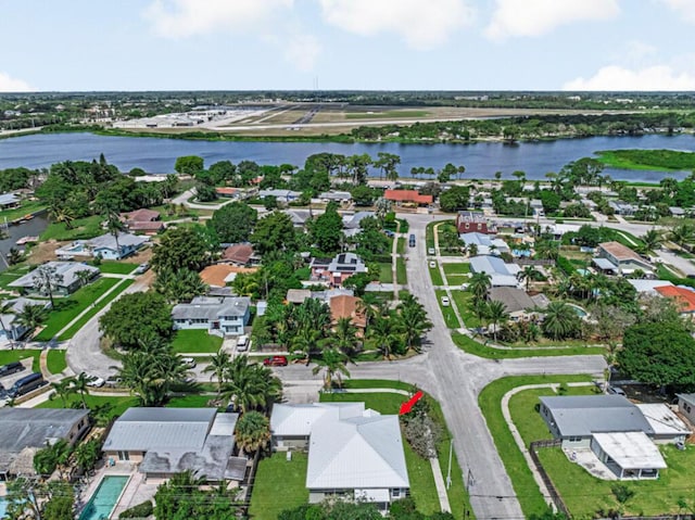 1501 Lee Ct, Lake Worth, FL 33461 - aerial view of property and surrounding area featuring a nearby body of water and nearby suburban area
