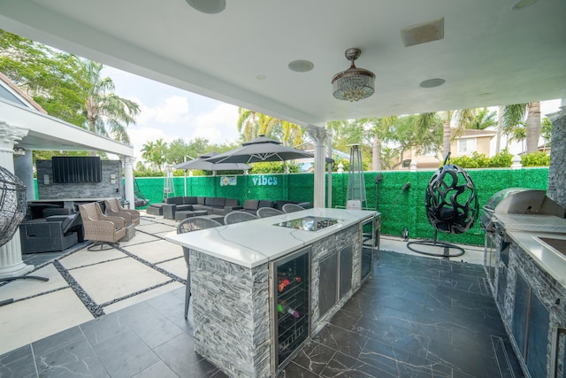 4941 SW 150th Ter, Miramar, FL 33027 - view of patio / terrace featuring area for grilling, outdoor lounge area, and fence