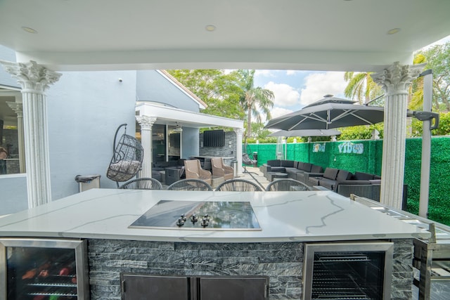4941 SW 150th Ter, Miramar, FL 33027 - view of patio / terrace featuring beverage cooler and outdoor lounge area