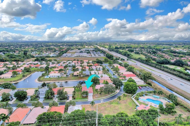 aerial view with a water view and a residential view