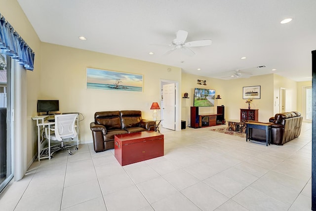 living area with light tile patterned floors, ceiling fan, and recessed lighting