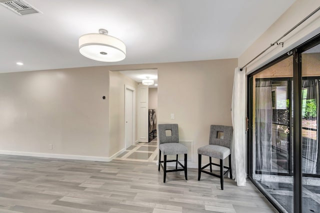 4875 Hawkwood Rd Unit B, Boynton Beach, FL 33436 - living area featuring baseboards, light wood-type flooring, visible vents, and recessed lighting