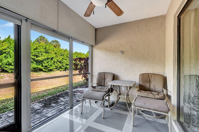 4875 Hawkwood Rd Unit B, Boynton Beach, FL 33436 - sunroom featuring a ceiling fan and a healthy amount of sunlight