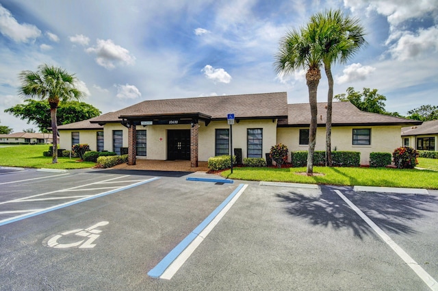 4875 Hawkwood Rd Unit B, Boynton Beach, FL 33436 - view of property with uncovered parking