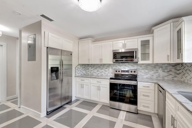4875 Hawkwood Rd Unit B, Boynton Beach, FL 33436 - kitchen featuring appliances with stainless steel finishes, visible vents, and white cabinetry