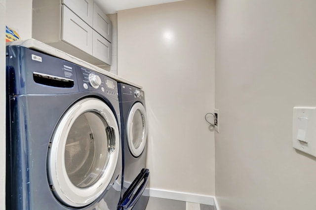 4875 Hawkwood Rd Unit B, Boynton Beach, FL 33436 - laundry area featuring laundry area, baseboards, and washing machine and dryer