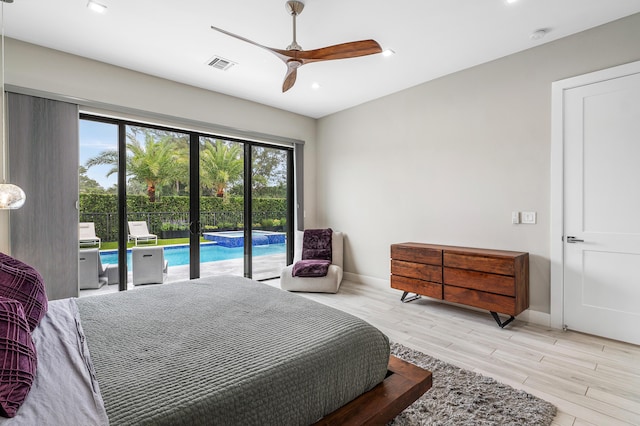 bedroom featuring access to outside, baseboards, visible vents, and light wood-style flooring